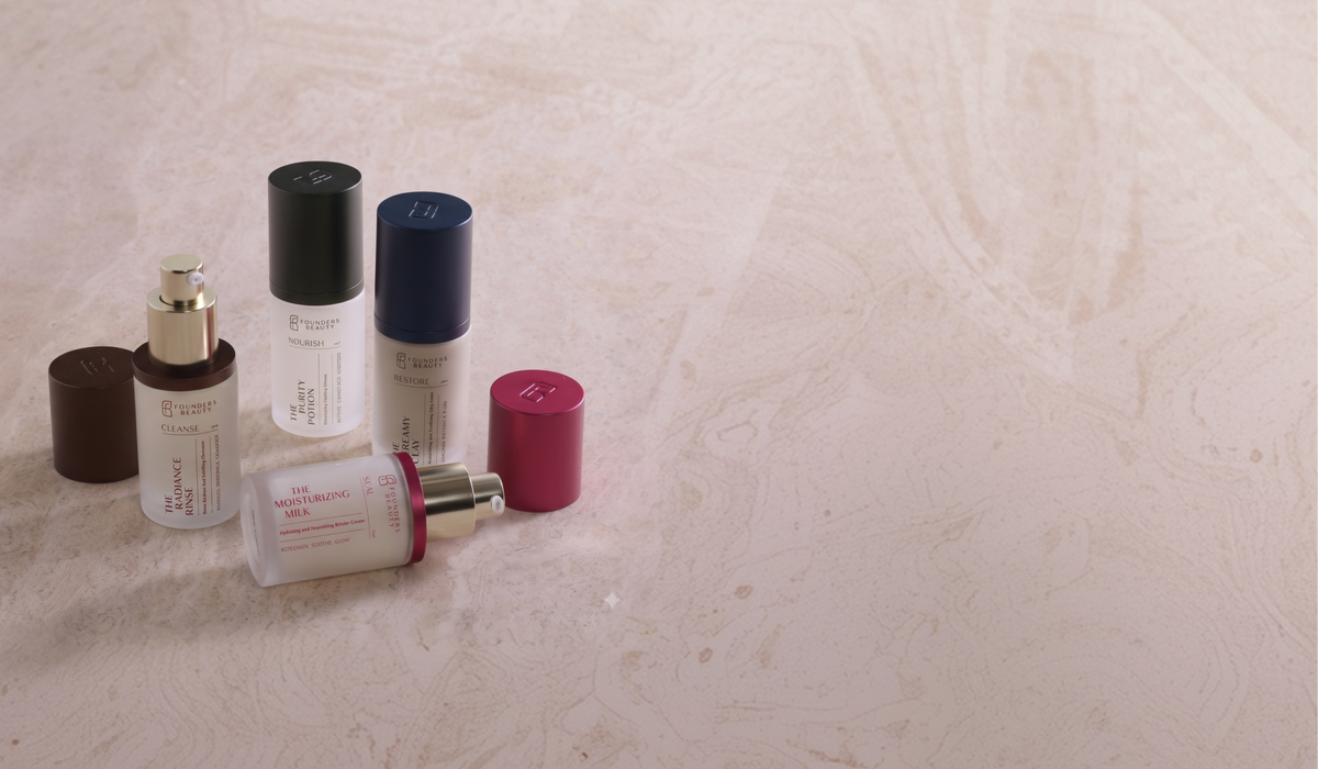 Founders Beauty skincare bottles arranged on a light textured surface